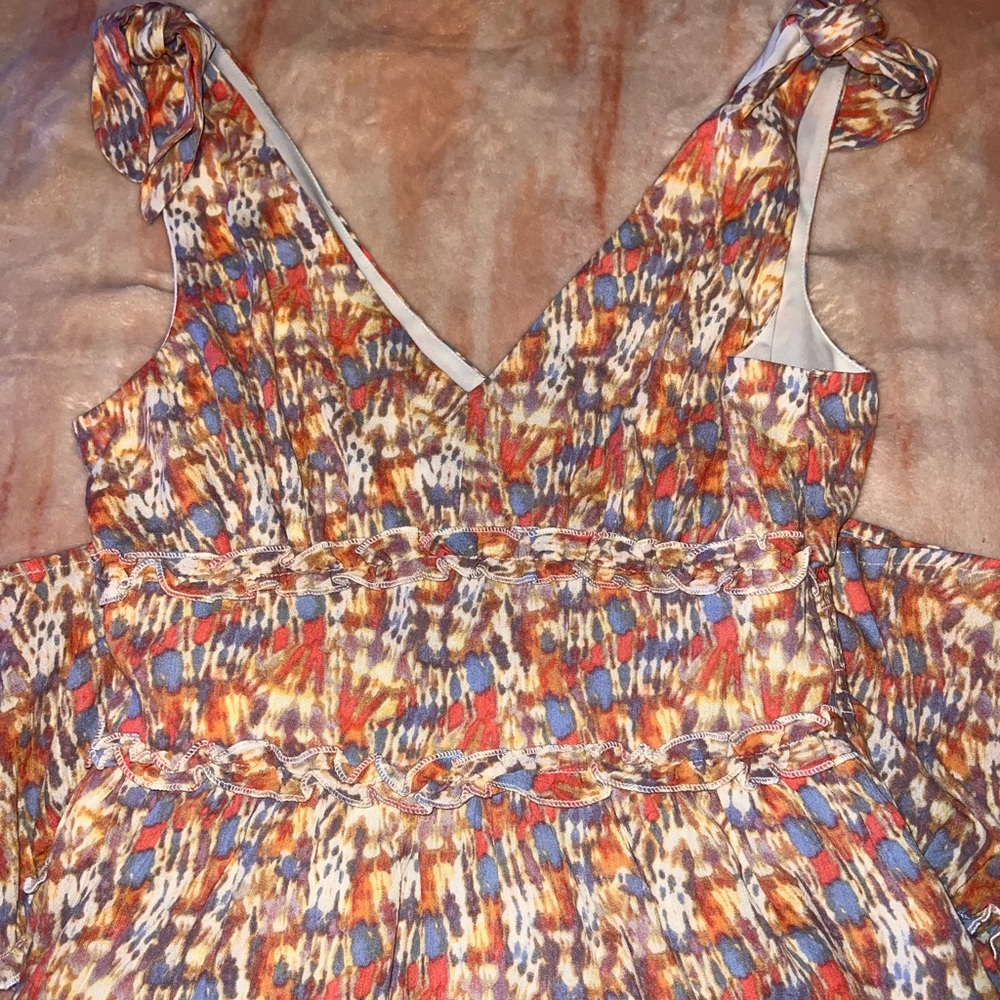sun dress with tie sleeves and low cut v neck